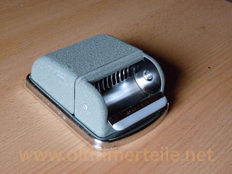 ashtray,forge scale coated, with crome ornamental strip
width: ca 90mm
height: ca 120mm 