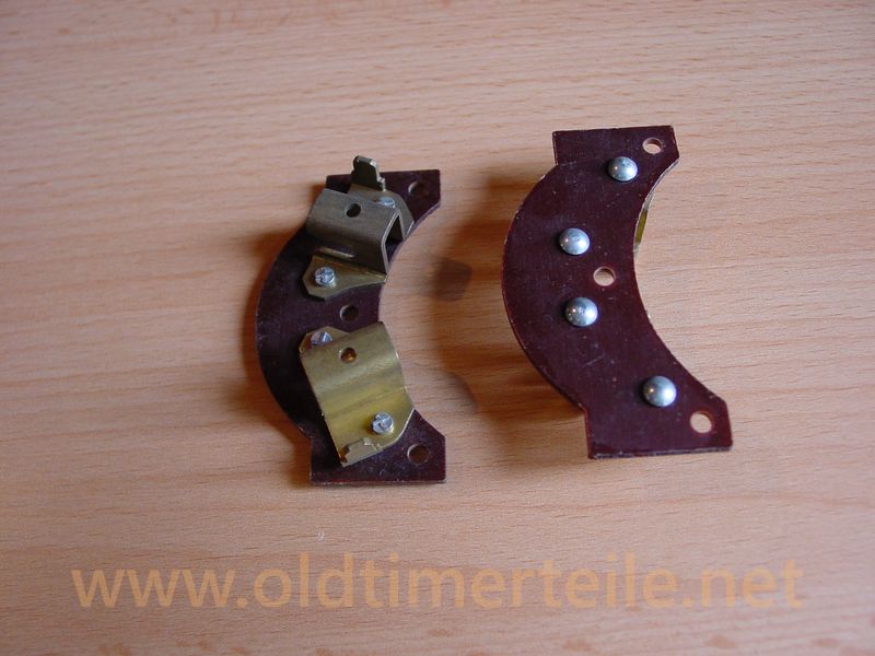 Brush holder plate